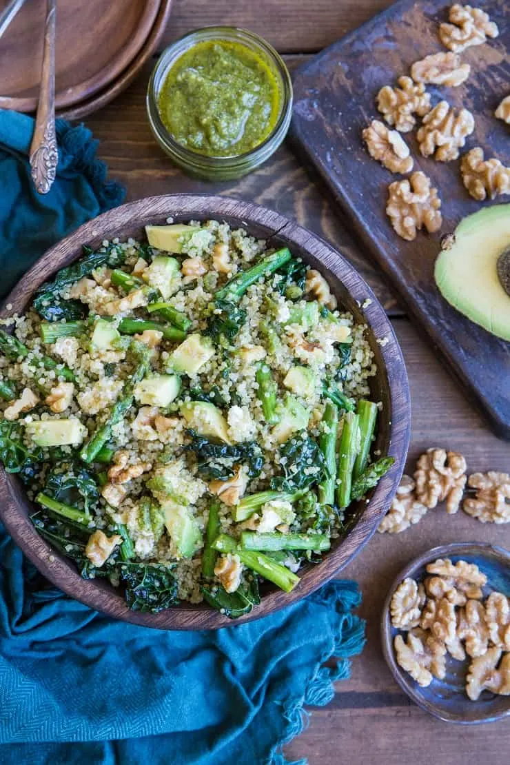 Pesto Quinoa Salad with Kale, Asparagus, Avocado, Walnuts, and Feta. A light and refreshing side dish perfect for sharing