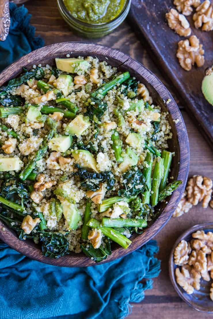 Pesto Quinoa Salad with Kale, Asparagus, Avocado, Walnuts, and Feta. A light and refreshing side dish perfect for sharing