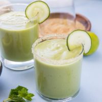 Tropical Avocado Cocktail with mango, pineapple juice, coconut milk, cucumber, mint and lime. These healthy refined sugar-free cocktails are refreshing and delicious!