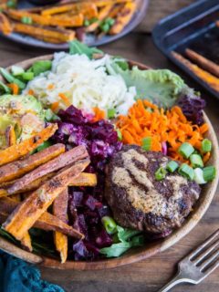 Burger Bowls with Chipotle Sauce, sauerkraut, pickled beets, carrots, mixed greens and avocado - a nutritious approach to hamburgers! These bowls are a healthy dinner option and are easy to make any night of the week!