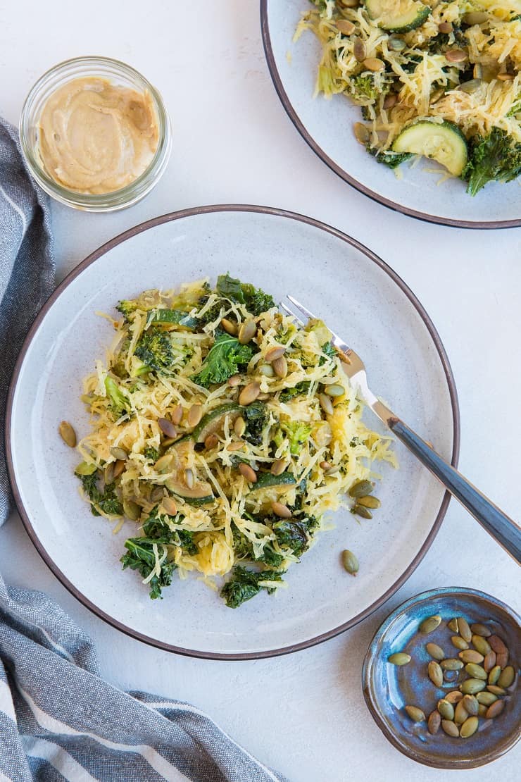 Creamy Tahini Spaghetti Squash with kale, zucchini and broccoli - a healthy paleo, vegan meal