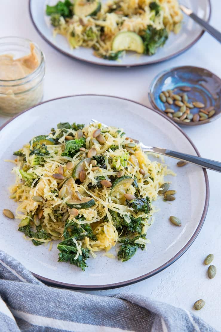 Creamy Tahini Spaghetti Squash with kale, zucchini and broccoli - a healthy paleo, vegan meal