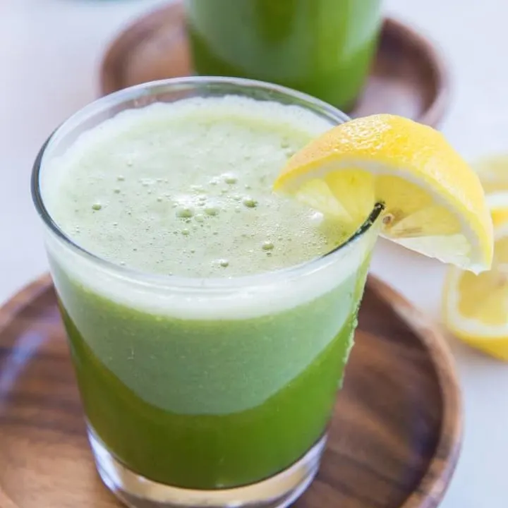 Happy Digestion Celery Juice - home-juiced celery juice with cucumber, orange and lemon for the ultimate healthy gut elixir. | TheRoastedRoot.net #greenjuice #detox #vegan