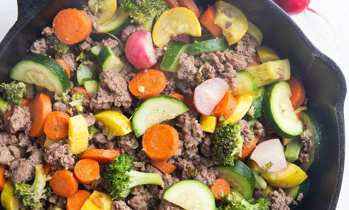 Horizontal photo of finished ground beef and vegetable skillet. Ready to serve.