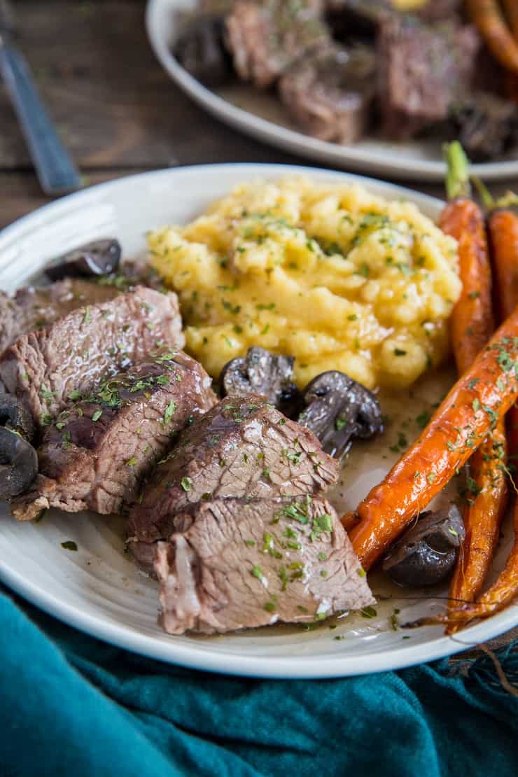 Slow Cooker Bison Roast with Mashed Rutabaga and Gravy, and Roasted Carrots - this sexy Paleo meal is perfect for date night.
