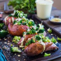 Vegan Broccoli "Cheddar" Stuffed Sweet Potatoes with a homemade dairy-free "cheese" sauce - a clean and simple weeknight side dish or meal. | TheRoastedRoot.net #glutenfree #paleo #vegetarian