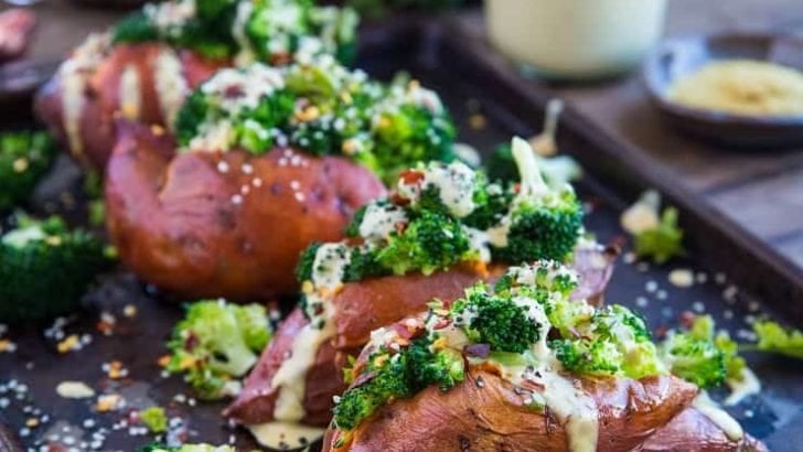 Vegan Broccoli "Cheddar" Stuffed Sweet Potatoes with a homemade dairy-free "cheese" sauce - a clean and simple weeknight side dish or meal. | TheRoastedRoot.net #glutenfree #paleo #vegetarian