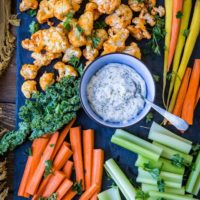 Buffalo Cauliflower Bites - a vegetarian version of buffalo wings made paleo, keto, low-carb, and whole30. A great appetizer for football season! | TheRoastedRoot.net #glutenfree #ketorecipe