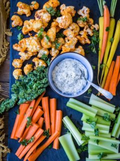 Buffalo Cauliflower Bites - a vegetarian version of buffalo wings made paleo, keto, low-carb, and whole30. A great appetizer for football season! | TheRoastedRoot.net #glutenfree #ketorecipe