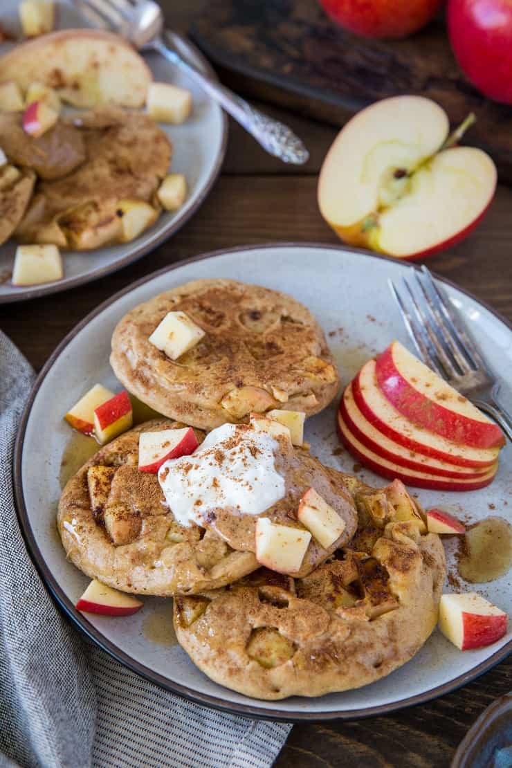 Paleo Apple Cinnamon Pancakes made with almond flour and tapioca flour. This super fluffy grain-free pancake recipe is a pure delight! | TheRoastedRoot.net #glutenfree #breakfast #healthy