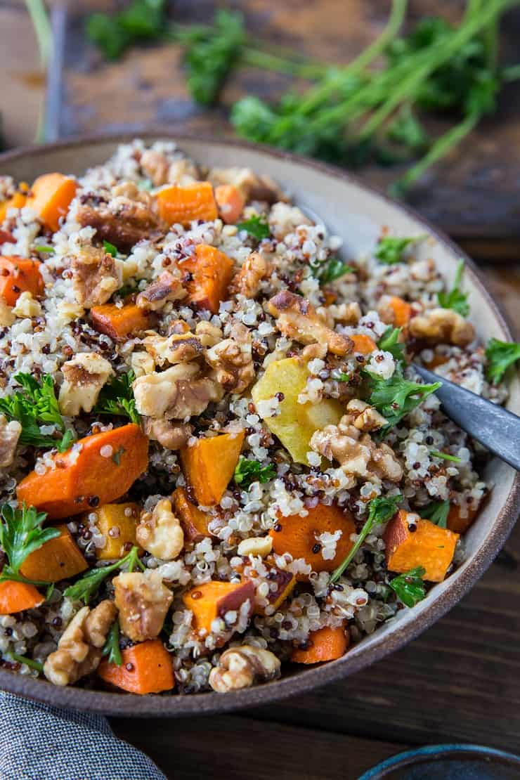 Roasted Winter Vegetable Quinoa Salad with Cider Vinaigrette - carrots, parsnips, butternut squash, sweet potato, parsley, and quinoa make up this gorgeous salad | TheRoastedRoot.net #paleo #vegan #vegetarian