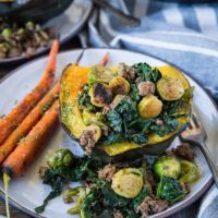 Stuffed Acorn Squash with Ground Beef, Brussels Sprouts, and Kale - a clean, nutritious dinner recipe that's paleo, low-carb, and whole30 | TheRoastedRoot.net #glutenfree