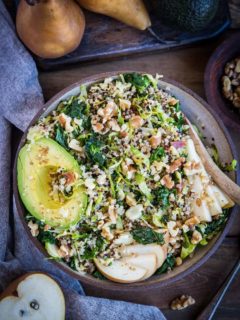 Warm Brussles Sprouts Salad with Kale, Quinoa, Pears, and Bacon Vinaigrette - an incredibly nutritious salad or side dish to share with friends and family | TheRoastedRoot.com #glutenfree #healthyrecipe