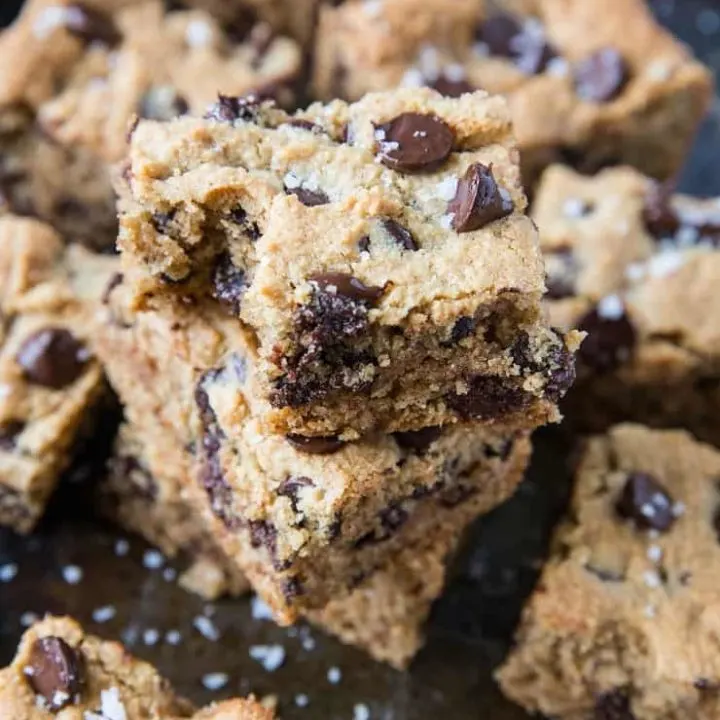 Paleo Chocolate Chip Cookie Bars - grain-free, refined sugar-free, healthy cookie bars made with almond flour and pure maple syrup | TheRoastedRoot.com #glutenfree #dessert