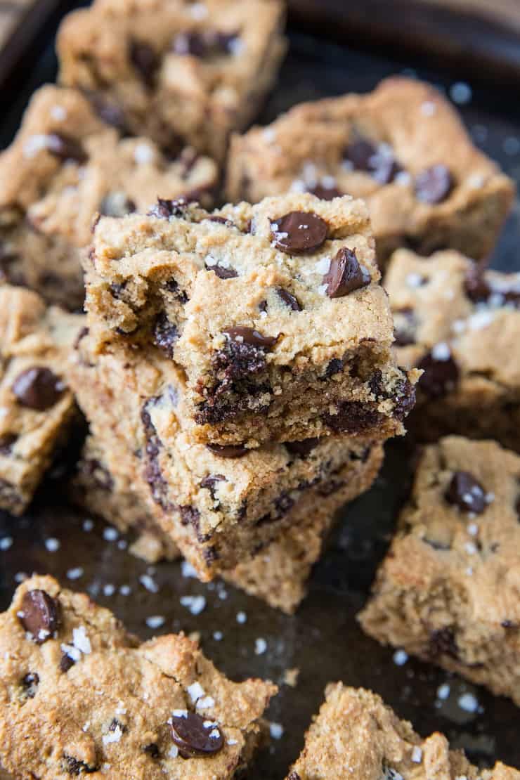 Paleo Chocolate Chip Cookie Bars - grain-free, refined sugar-free, healthy cookie bars made with almond flour and pure maple syrup | TheRoastedRoot.com #glutenfree #dessert