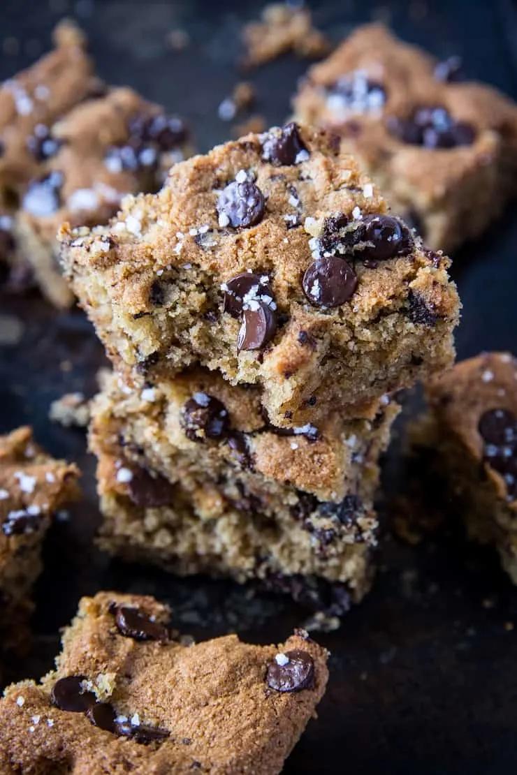 Paleo Chocolate Chip Cookie Bars - grain-free, refined sugar-free, healthy cookie bars made with almond flour and pure maple syrup | TheRoastedRoot.com #glutenfree #dessert