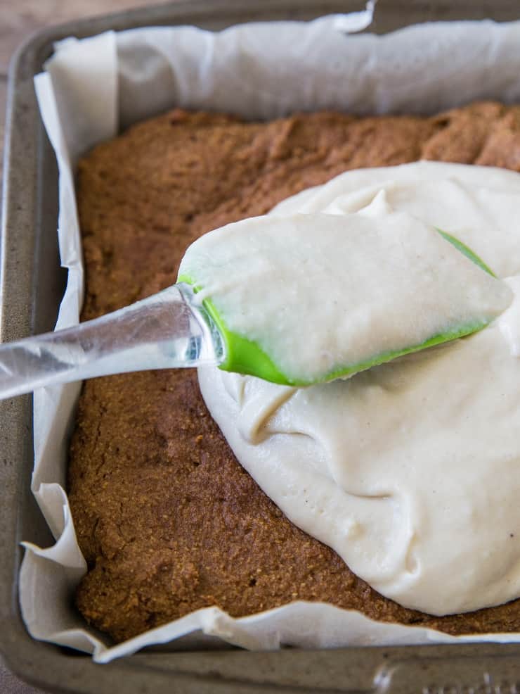 Paleo & Vegan Pumpkin Snack Cake with vegan "cream cheese" frosting - grain-free, dairy-free, egg-free, super moist and delicious! | TheRoastedRoot.net