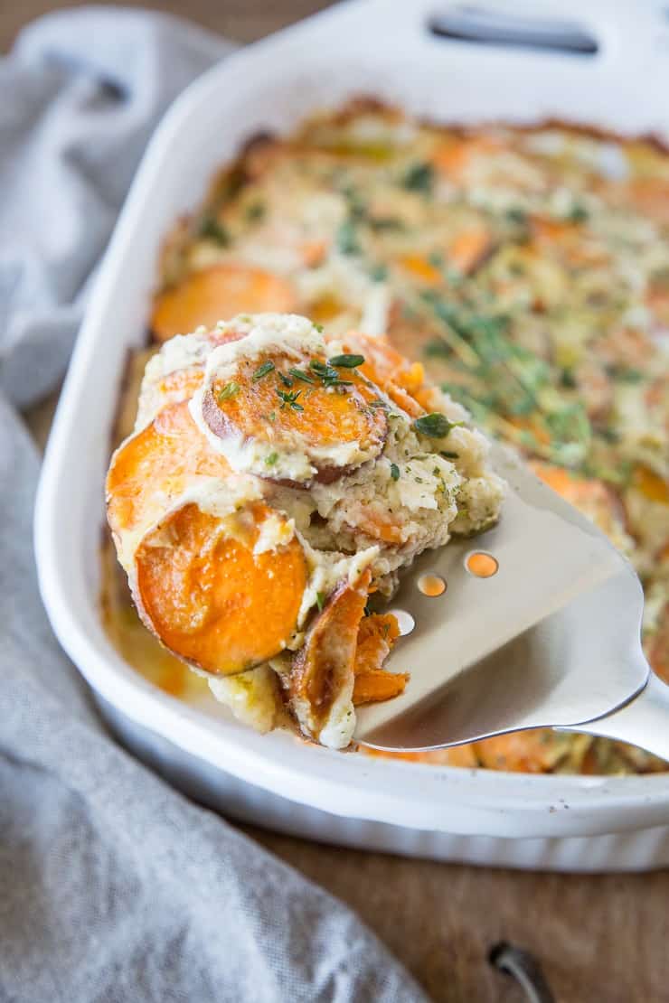 Paleo Scalloped Sweet Potatoes - dairy-free with a cauliflower sauce | Theroastedroot.net