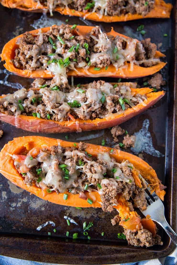 Taco-Stuffed Sweet Potatoes - an easy, healthy dinner recipe | TheRoastedRoot.net #glutenfree