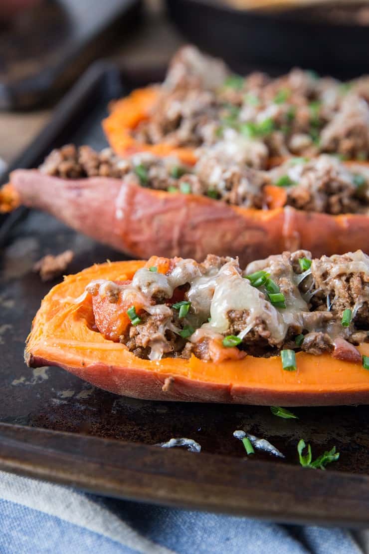 Taco-Stuffed Sweet Potatoes - an easy, healthy dinner recipe | TheRoastedRoot.net #glutenfree