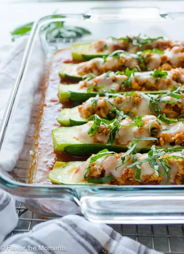 Chicken Parmesan Stuffed Zucchini Boats + 65 Keto Recipes | TheRoastedRoot.net #lowcarb #keto