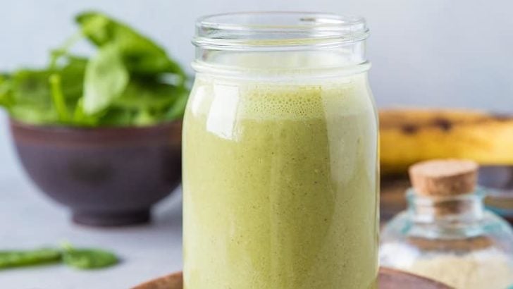 Green Adaptogenic Protein Smoothie - a calming, nutrient-rich meal in a glass with all sorts of health benefits | TheRoastedRoot.net