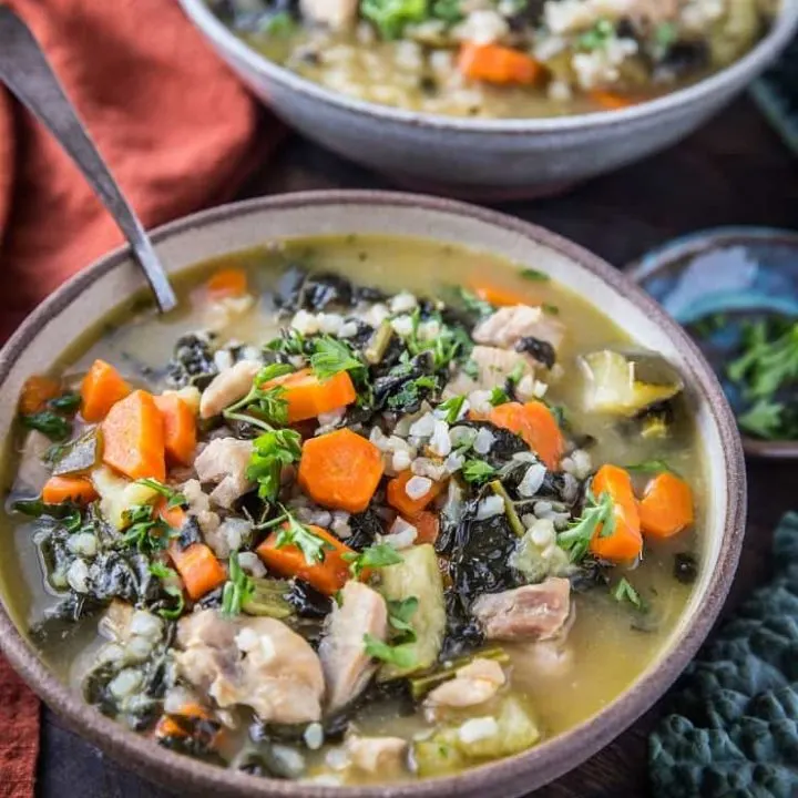 Instant Pot Chicken Soup with Rice, vegetables, and kale. An easy, clean dinner recipe made in your pressure cooker! | TheRoastedRoot.net #glutenfree #healthy #chickensoup