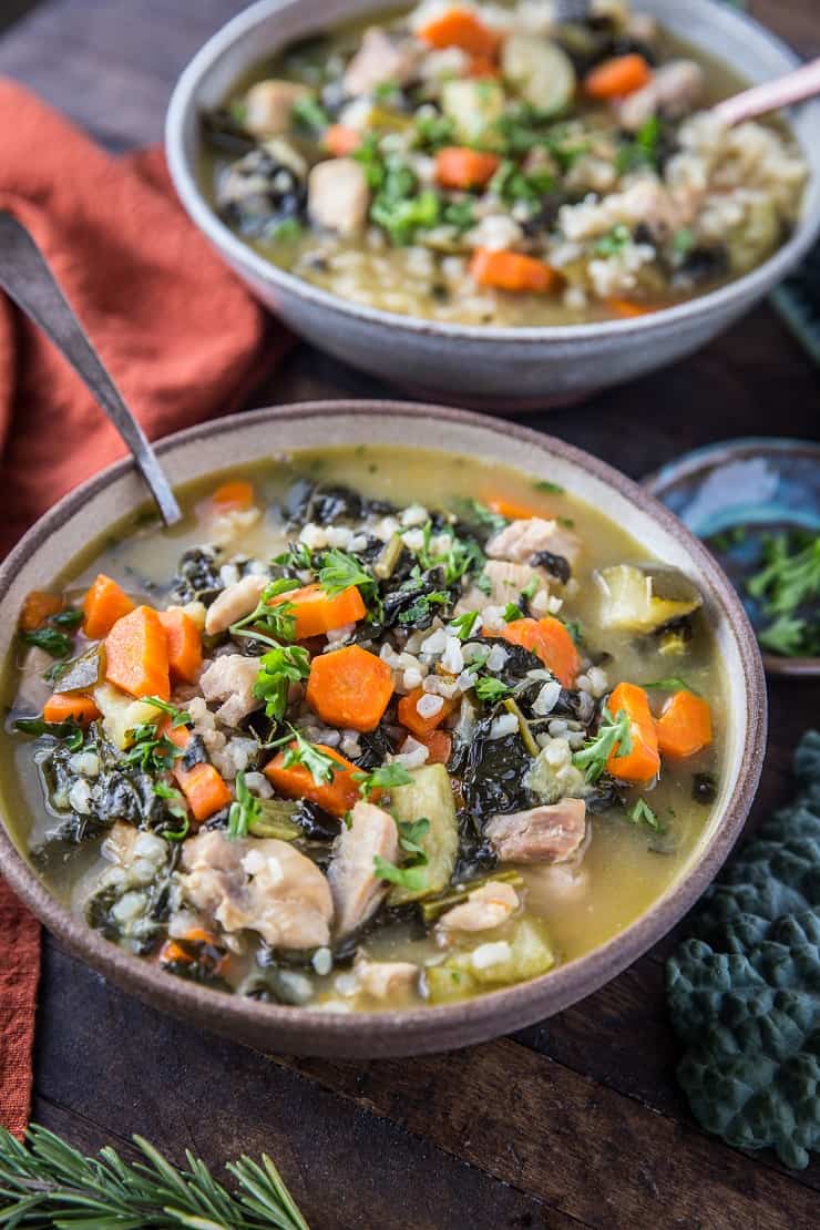 Instant Pot Chicken Soup with Rice, vegetables, and kale. An easy, clean dinner recipe made in your pressure cooker! | TheRoastedRoot.net #glutenfree #healthy #chickensoup 