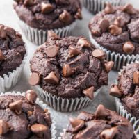 Paleo Double Chocolate Banana Bread Muffins made with almond flour - this easy recipe is made in a blender, is grain-free, dairy-free, oil-free, and includes a vegan option! TheRoastedRoot.com