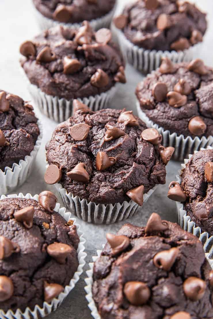 Paleo Double Chocolate Banana Bread Muffins made with almond flour - this easy recipe is made in a blender, is grain-free, dairy-free, oil-free, and includes a vegan option! TheRoastedRoot.com