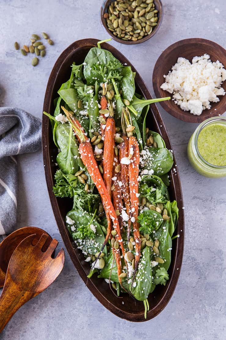 Roasted Carrot Spinach Salad with Lemon Herb Dressing - a simple clean salad that is primal and keto. | TheRoastedRoot.net #cleaneating #vegetarian #glutenfree