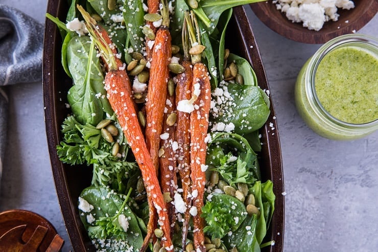 Roasted Carrot Spinach Salad with Lemon Herb Dressing - a simple clean salad that is primal and keto. | TheRoastedRoot.net #cleaneating #vegetarian #glutenfree