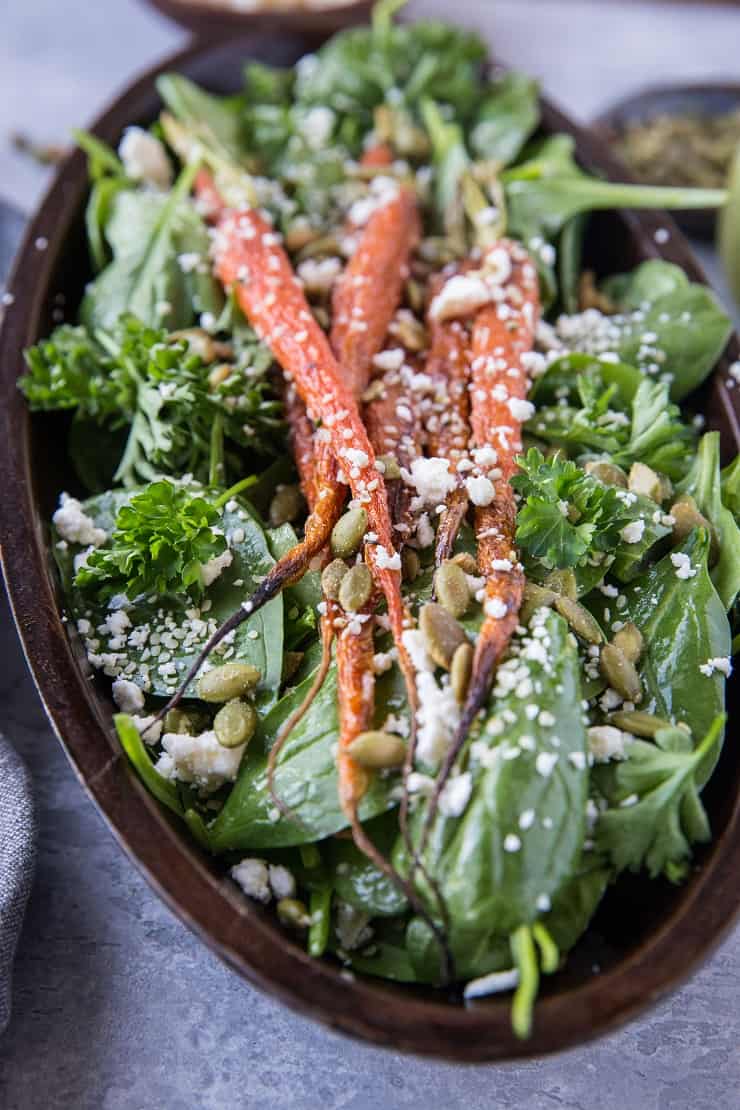 Roasted Carrot Spinach Salad with Lemon Herb Dressing - a simple clean salad that is primal and keto. | TheRoastedRoot.net #cleaneating #vegetarian #glutenfree