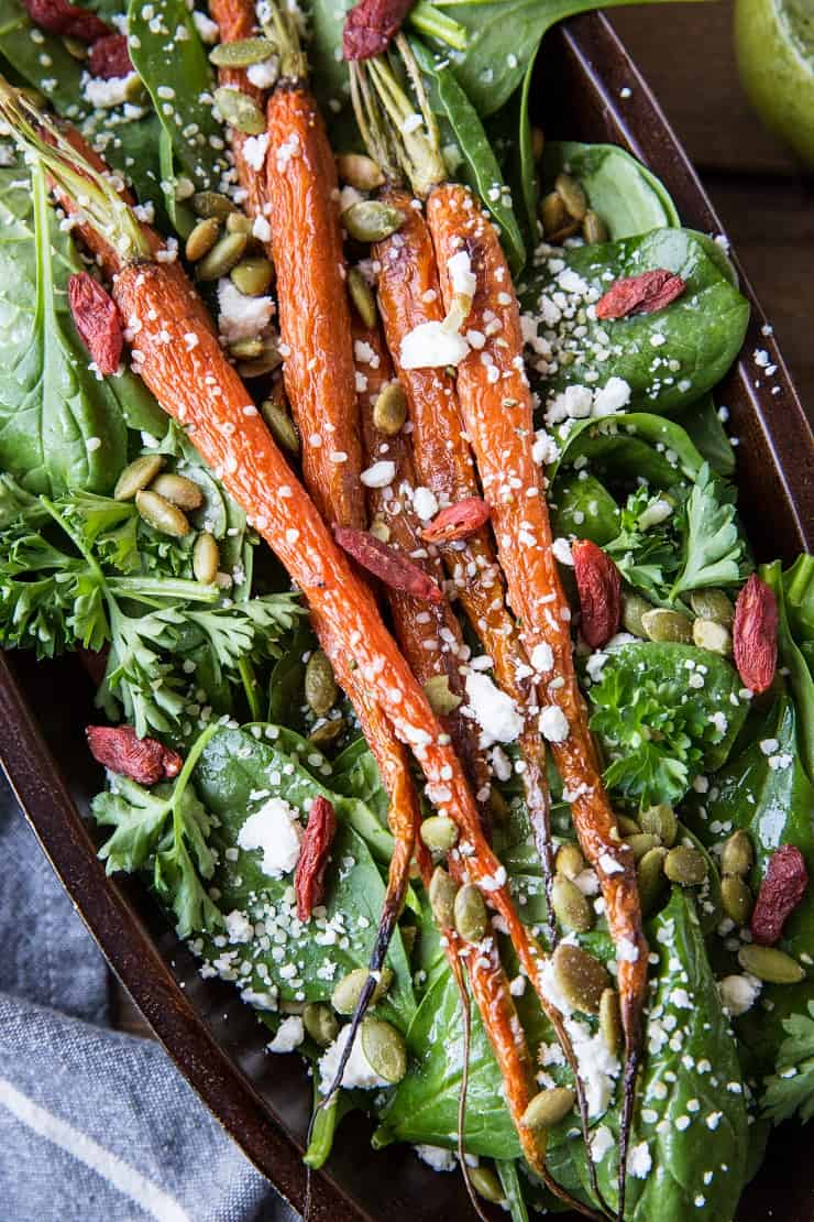 Roasted Carrot Spinach Salad with Lemon Herb Dressing - a simple clean salad that is primal and keto. | TheRoastedRoot.net #cleaneating #vegetarian #glutenfree