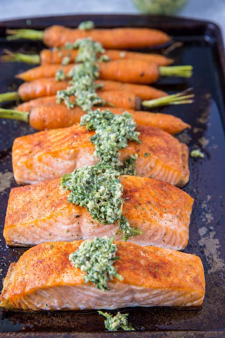 Sheet Pan Salmon and Carrots with Carrot Top Pesto - a whole30, paleo, keto diner recipe that requires just 35 minutes to make! | TheRoastedRoot.net 