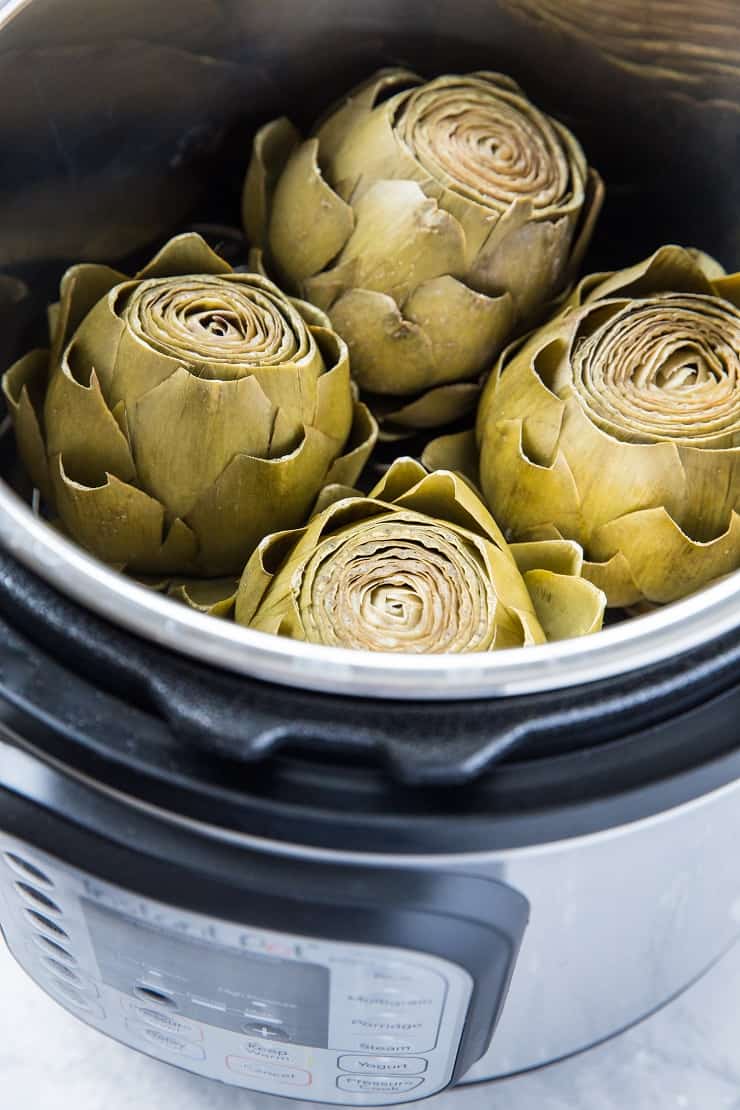 How to Cook Artichokes in the Instant Pot - a photo tutorial on preparing artichokes in a pressure cooker | TheRoastedRoot.net