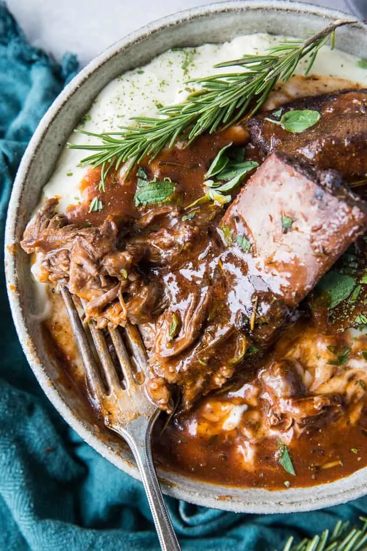 Instant Pot Red Wine Braised Short Ribs - a classic recipe for short ribs made easy in your pressure cooker | TheRoastedRoot.com 