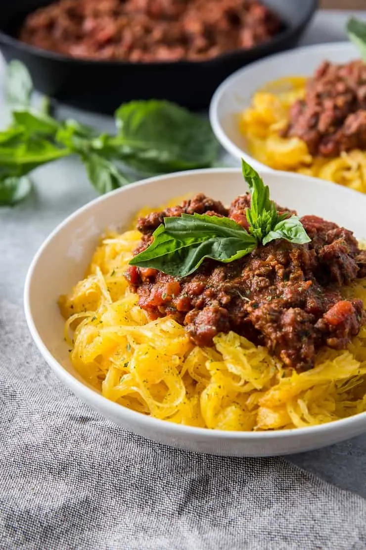 Spaghetti Squash Bolognese - an easy, nutritious low-carb, paleo weeknight meal | theroastedroot.net