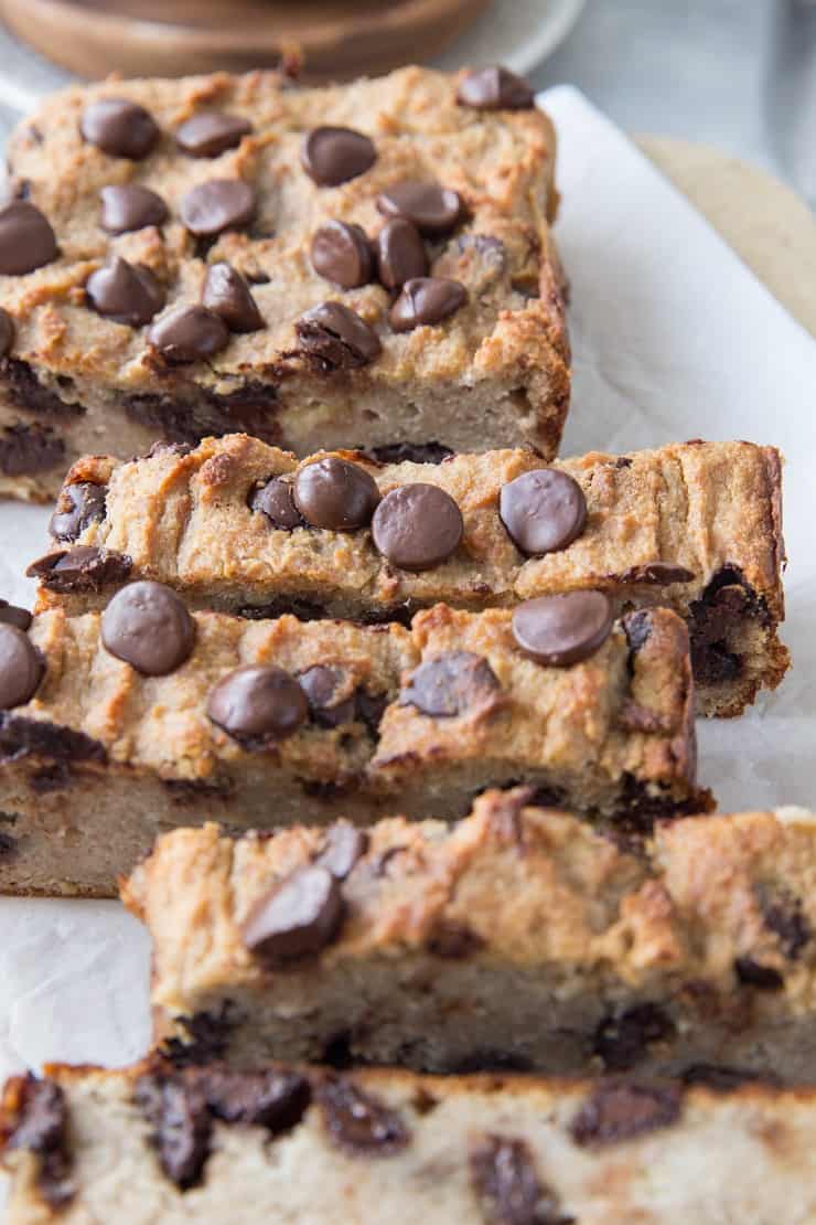 Chocolate Chip Paleo Vegan Banana Bread - a moist and dense healthy recipe that is dairy-free, oil-free, and refined sugar-free | TheRoastedRoot.net #vegan #glutenfree #grainfree #vegan