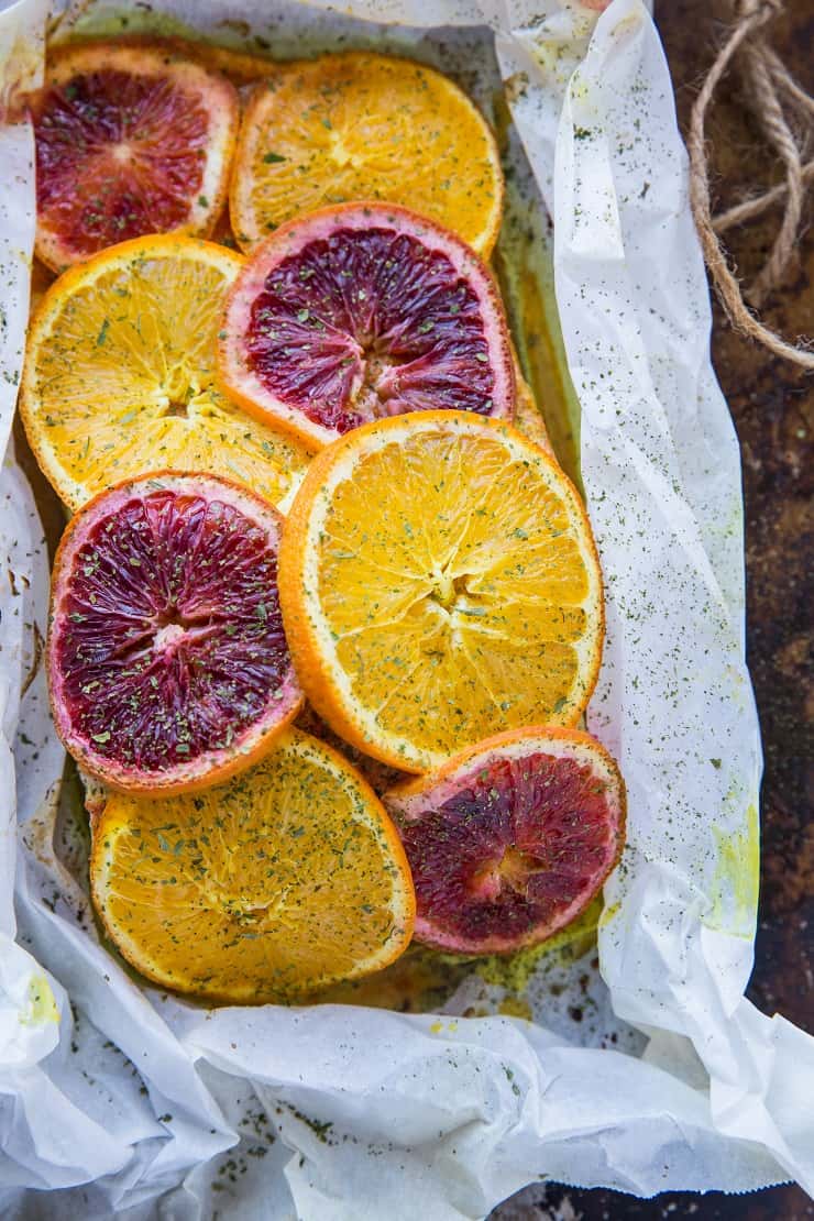 Citrus Ginger Turmeric Parchment Paper Salmon - an easy method for cooking salmon that results in a nutrient-dense entree | TheRoastedRoot.net