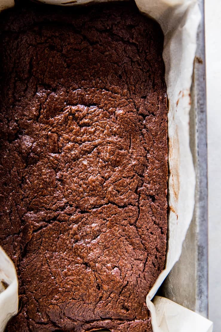 Decadent Fudgy Keto Brownies - made with almond flour and monk fruit sweetener - an easy recipe with a vegan option! | TheRoastedRoot.net