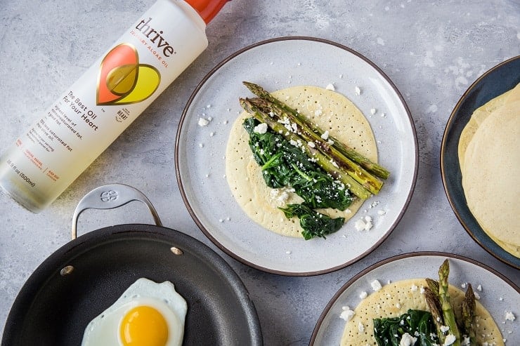 Savory Paleo Crepes with Roasted Asparagus, Spinach, and Feta - grain-free crepes made with almond flour and tapioca flour | TheRoastedRoot.net #glutenfree #breakfast