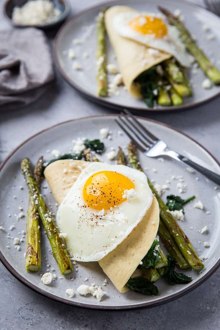 Savory Paleo Crepes with Roasted Asparagus, Spinach, and Feta - grain-free crepes made with almond flour and tapioca flour | TheRoastedRoot.net #glutenfree #breakfast