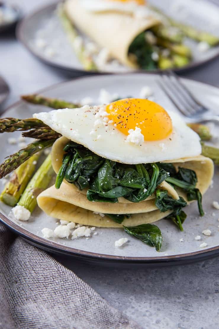 Savory Paleo Crepes with Roasted Asparagus, Spinach, and Feta - grain-free crepes made with almond flour and tapioca flour | TheRoastedRoot.net #glutenfree #breakfast