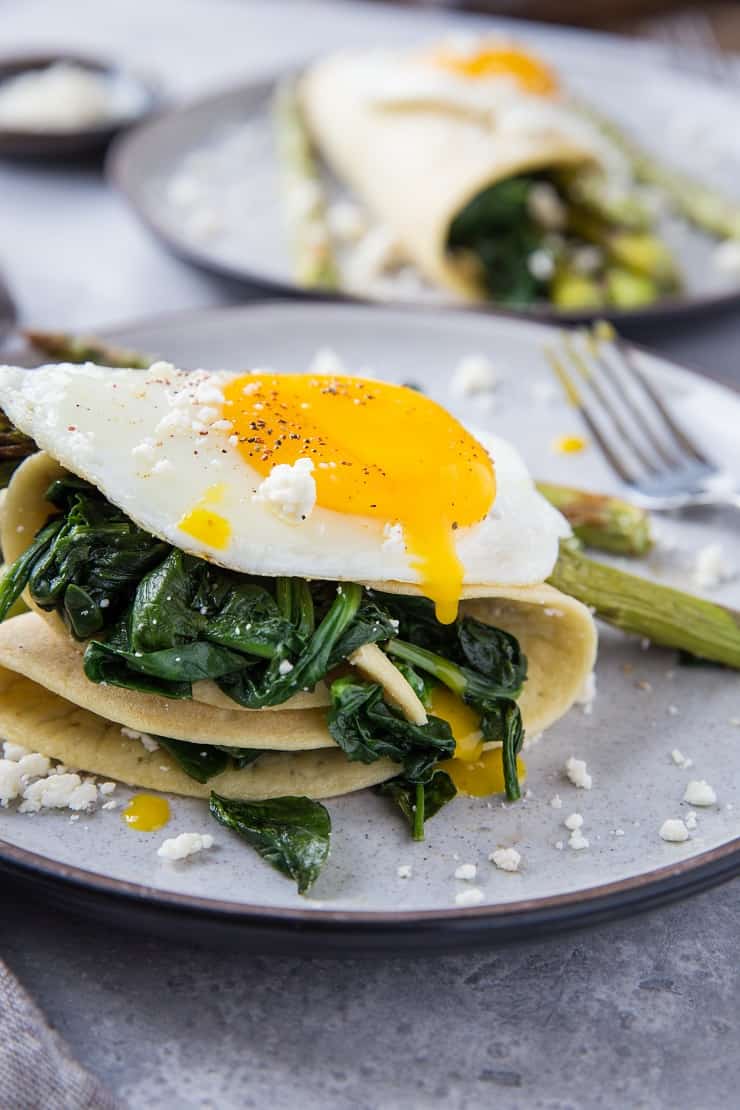 Savory Paleo Crepes with Roasted Asparagus, Spinach, and Feta - grain-free crepes made with almond flour and tapioca flour | TheRoastedRoot.net #glutenfree #breakfast