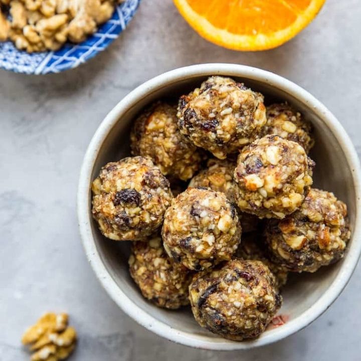 Cranberry Orange Protein Balls - healthy paleo-friendly snack made with nuts, seeds, orange zest, dates, and dried cranberries | TheRoastedRoot.net