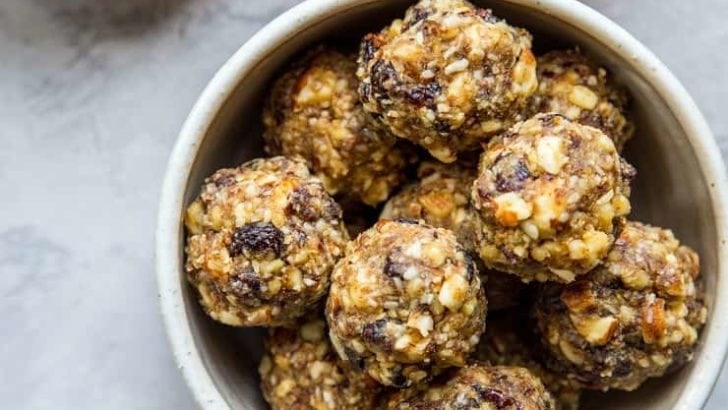 Cranberry Orange Protein Balls - healthy paleo-friendly snack made with nuts, seeds, orange zest, dates, and dried cranberries | TheRoastedRoot.net