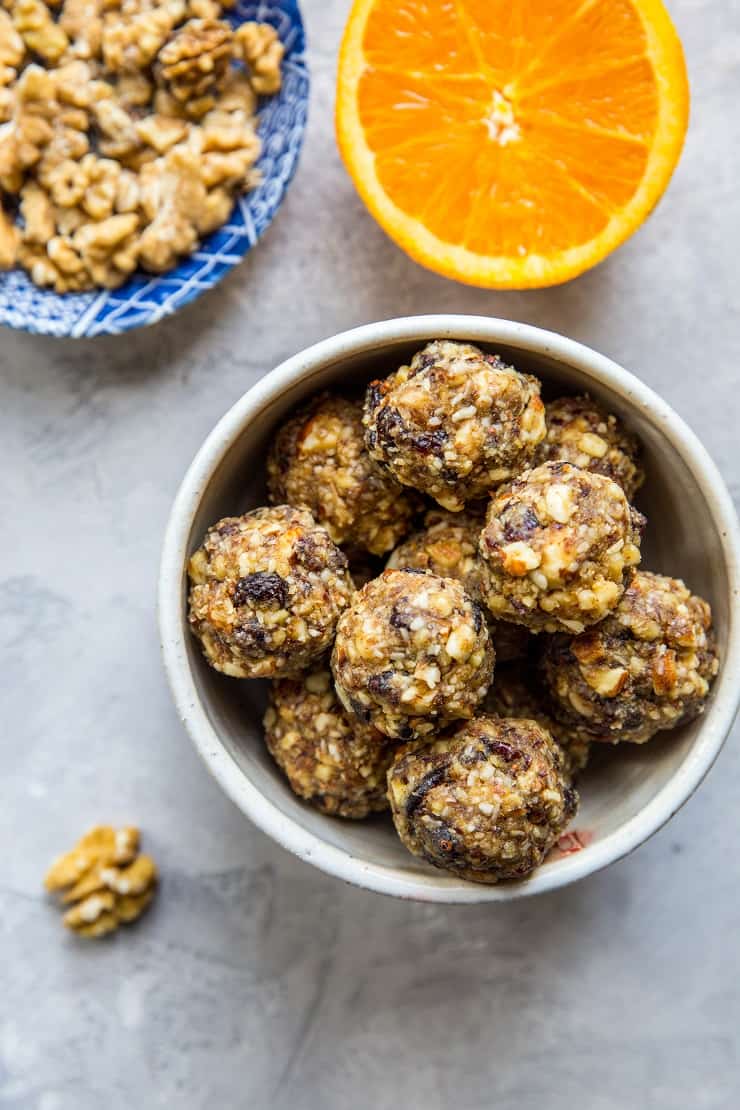 Cranberry Orange Protein Balls - healthy paleo-friendly snack made with nuts, seeds, orange zest, dates, and dried cranberries | TheRoastedRoot.net