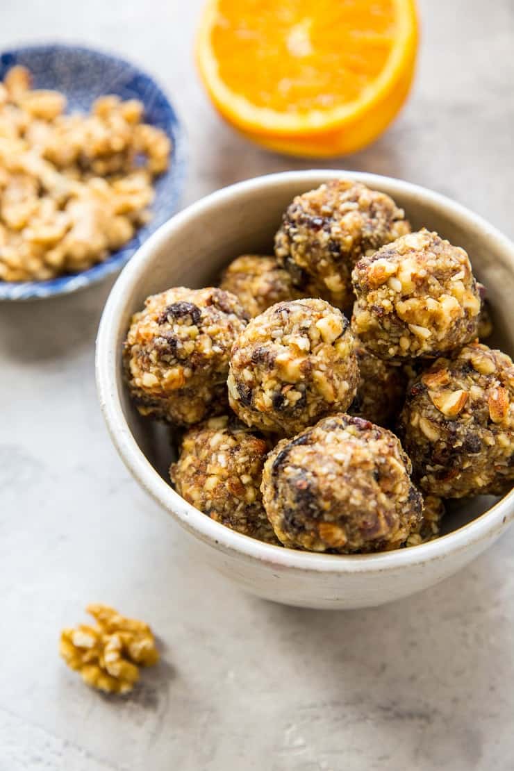 Cranberry Orange Protein Balls - healthy paleo-friendly snack made with nuts, seeds, orange zest, dates, and dried cranberries | TheRoastedRoot.net