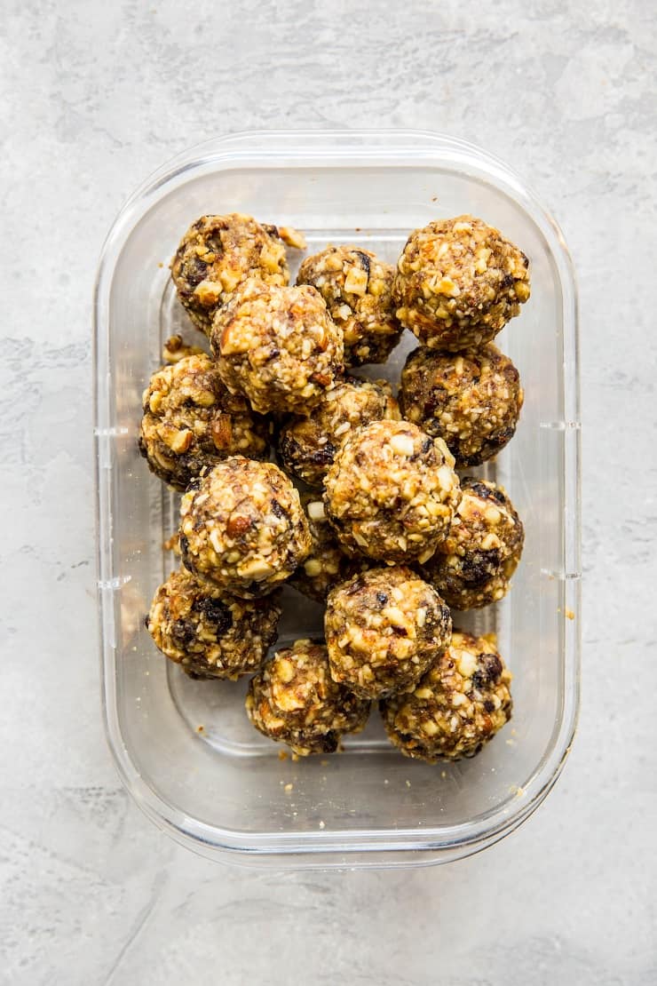 Cranberry Orange Protein Balls - healthy paleo-friendly snack made with nuts, seeds, orange zest, dates, and dried cranberries | TheRoastedRoot.net